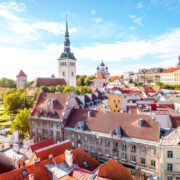Cityscape aerial view on the old town with saint Nicholas church tower and Toompea hill in Tallin, Estonia